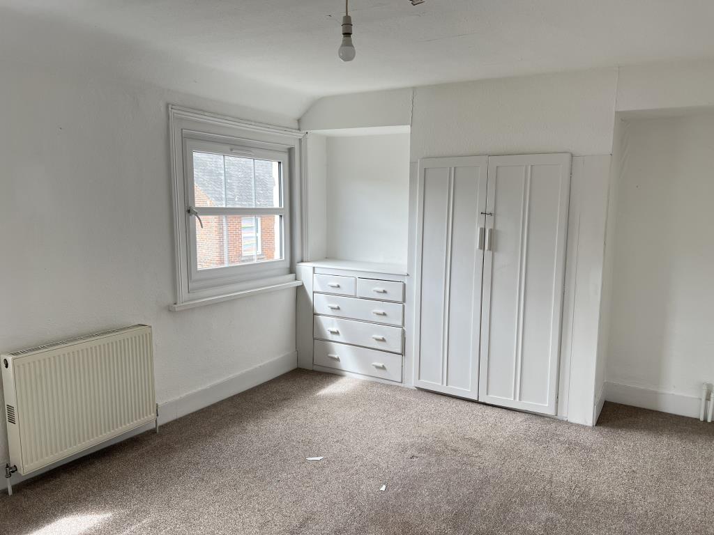 Lot: 145 - THREE-BEDROOM MAISONETTE FOR INVESTMENT OR OCCUPATION - Bedroom one with built in storage